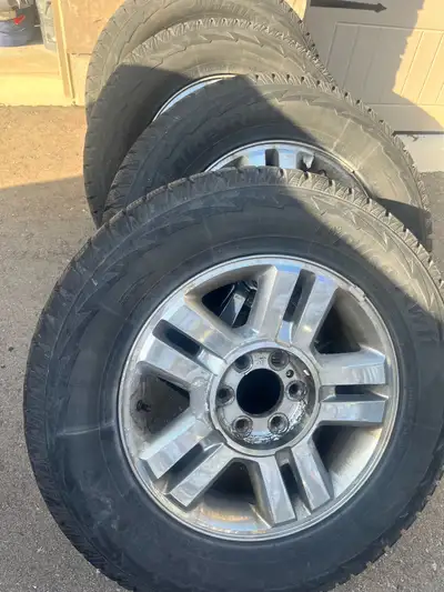 I am selling a set of four Hankook Spike RW06 winter tires, size P285/65R18, mounted on OEM Ford rim...