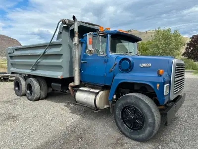 1990 Ford L8000 Gravel Dump Truck, with heavy duty rock box. 46” high steel sides, with steel angle...