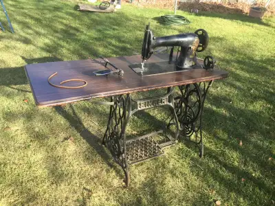 Singer treadle sewing machine, View more