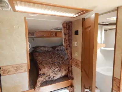 2008 Okanagan camper with slide. Queen bed, fridge/freezer, stove and oven and bathroom. $18000.00
