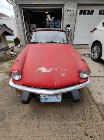 Selling my 1974 Triumph Spitfire 1500, a classic roadster with potential to be an excellent parts ca...