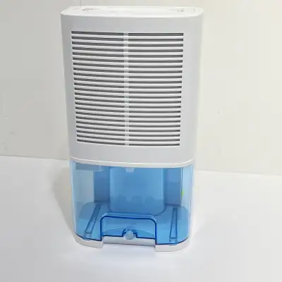 Keep your space dry and comfortable with this mini dehumidifier, model DN-607, designed for voltages...
