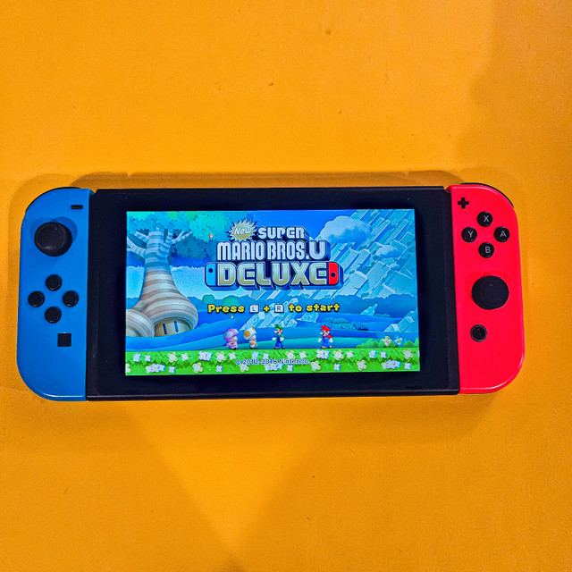 Nintendo Switch V2 with Comfort Grip in Nintendo Switch in Edmonton - Image 2