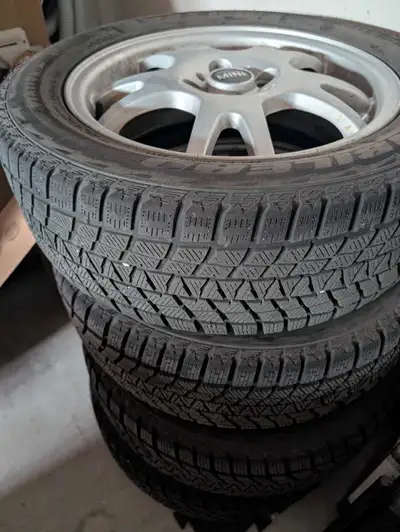Winter rims and tires from a mini Cooper. Great shape with lots of tread left.