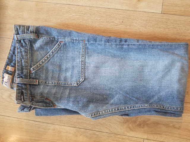 Like New Womans Size 28 Juicy Contour Blue Jeans in Women's - Bottoms in Calgary