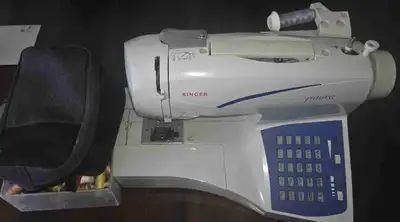 Singer Sewing Machine, View more