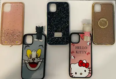 Pack of 5 covers Include: Swarovski, Hello Kitty with figure, Tom with figure, Golden, and clear. Th...