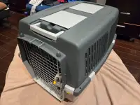 Dog crate with wheels
