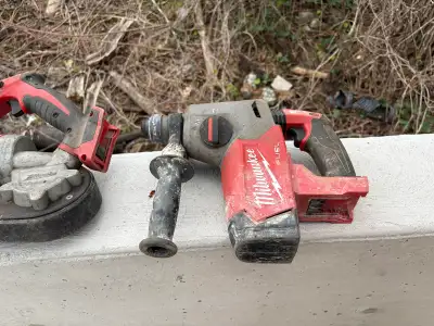 In great condition, and good working order. A battery hammer drill used a hand full of times, a band...