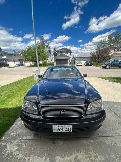 My 99 LS400. 3 owner car, backpack of service records. Some ugly rust spots which I may or may not f...