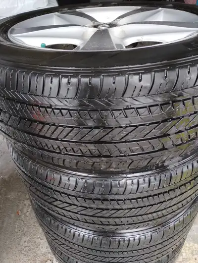 Bridgestone Ecopia Tires on Original Toyota Rims Size: 215/55R17 Load index: 93 Speed rating: V Desi...