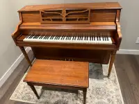 Piano and bench 