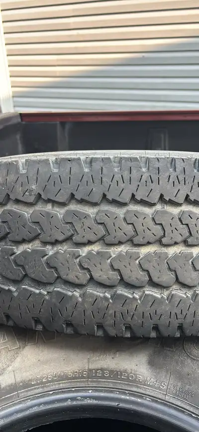 4 used tires LT 265 75 16 Weather checked but lots of tread on them