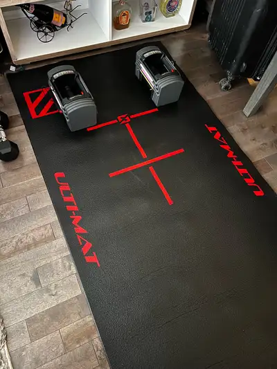 Mint condition PowerBlock adjustable dumbbells up to 50 lbs Training mat included Text 5149735248