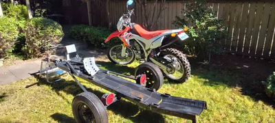Single Rail Moto Trailer With Upgrades New hardware and wiring. It's a manufactured-registered trail...