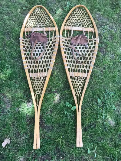Snowshoes. These are 48.5 inches tall and 13.75 inches wide. Also could be a fantastic decorating pi...