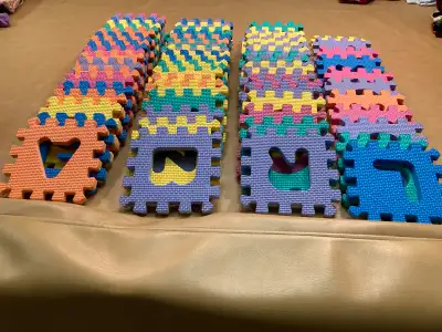 71 pieces - washable, soft foam puzzle play mat. Letters and numbers . Like new. from a smoke free h...