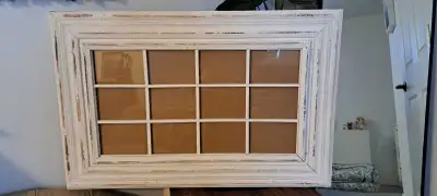 Large, heavy duty photo frame in "chippy" white paint style. Holds 12, 5x7 photos. Asking $100. Smal...