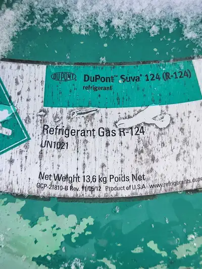 R124 refrigerant 2 bottles half full $50 obo