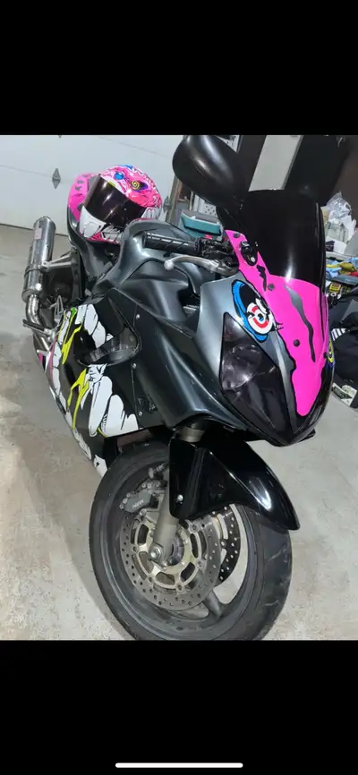 Chipped for speed Comes with Custom OEM Fif Fairings & matching a helmet. Also included original OEM...