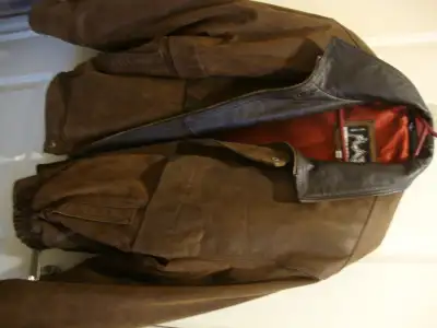 Selling a lined brown men's leather coat, size large. Brand is Flash. From a smoke-free and pet-free...