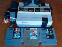 Console Nintendo avec 3 jeux et 2 manettes