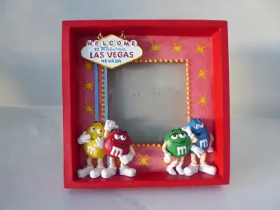 M&M’s collectible Las Vegas Photo Frame Frame size is 5.25 in x 5.25 in Fits approx 3.25 in x 3.25 i...