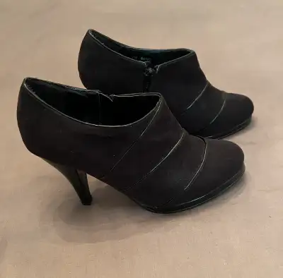 Women’s size 7 “Jessica” shoes. 3 inch heel. Zipper to close. Excellent condition, maybe worn once o...