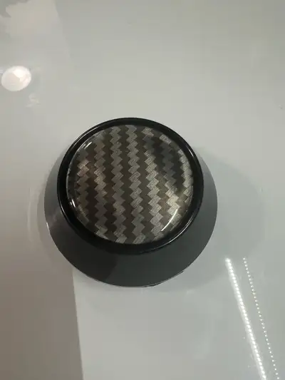 New set of four X Autohaux hubcap centre caps. 66mm inner diameter, 69 mm outer diameter. Carbon fib...