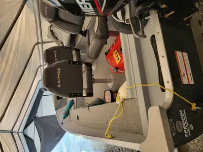 40 horse 4 stroke outboard , driverside windshield (removable), custom tarp , extra oil and spark pl...