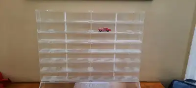 Display Shelf for Collectables, Model Cars, etc. Made by ACTION PERFORMANCE Has 7 rows down and 4 se...