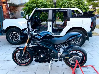 Get ready to rev your engine with this sleek Triumph Speed Triple! This used motorcycle boasts a pow...
