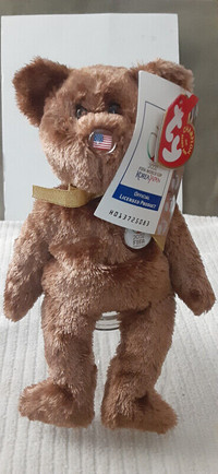 Ty Beanie Baby Champion the bear with the U.S Flag on the nose