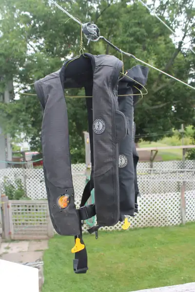 For Sale 2 Mustang Life Vest , Yellow for high Visibility and with D rings for sailing .. These rang...