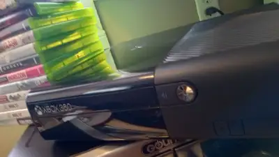 Xbox 360 + games + controlers, View more