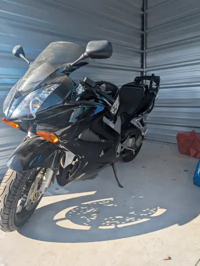 Selling my 2002 Honda VFR 800 Sport touring bike with luggage compartment and 2 spare tires. Has liq...