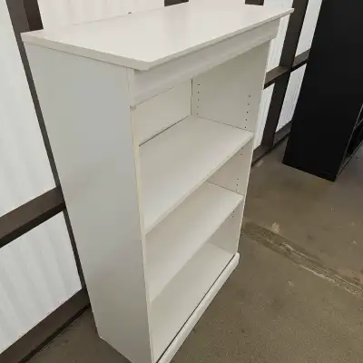 White book case or shelf cabinet in an excellent condition almost new . Nice scratches . Text 780-26...