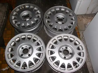 set of 4 attractive 15 spoke alloy rims. 4 bolt pattern. excellent condition. fits 195/65R15. these...
