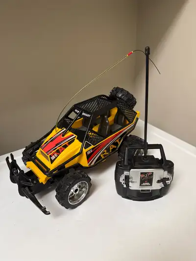 Rev up your imagination with this rad Radio Shack remote control car! It's seen a few races, so it's...