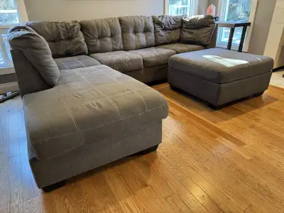 This is an Ashley Furniture sectional couch, perfect for a living room or recreational room! Used go...