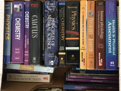 Gently used, good condition. From a smoke and pet free home. Includes 52 various textbooks and workb...