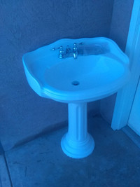 Pedestal sink. Used