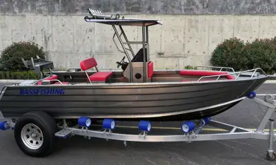 Pre-rigged, turn-key hull- controls, wiring, and steering installed. Just add an outboard.(Yamaha 90...