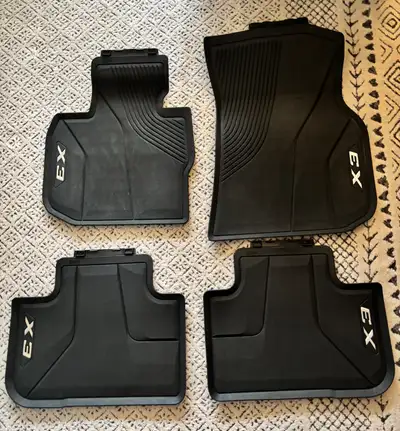 Set of 4 Original Equipment BMW Rubber Floor Mats. From a 2024 but should fit 2018-2024 Used very li...