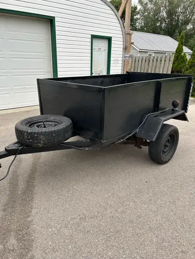 Utility Trailer About 52” wide 7ft long Wheel bearings recently repacked Tires in good shape still s...