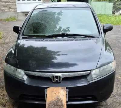 Selling it As is. Using it to go to work and want to upgrade to another car. Need back brake pad and...
