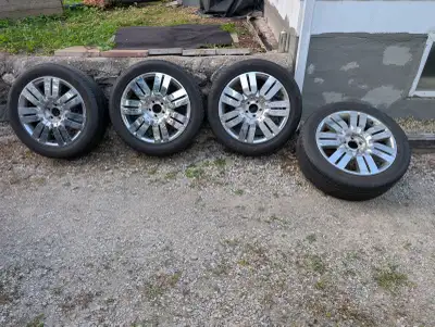 Excellent condition tires and alloy rims for sale. 20” inch aluminum rims, came off Lincoln 5x114.3m...
