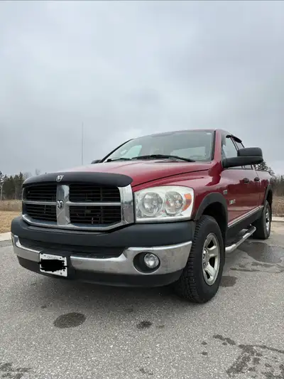 Strong running HEMI with 4x4. Truck drives but will need work for safety — priced accordingly. Specs...
