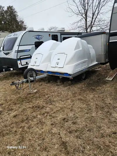 trailer is in good condition ready to go new led lights new tires and springs snowmobiles in the pic...