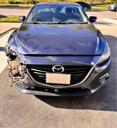 Damaged 2014 Mazda3 for sale, as-is. I am the second owner of this car and I have had it since 2016....